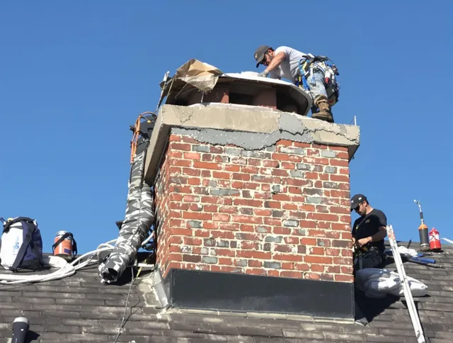 Torrance Chimney Sweep installing a custom chimney crown in Torrance, CA